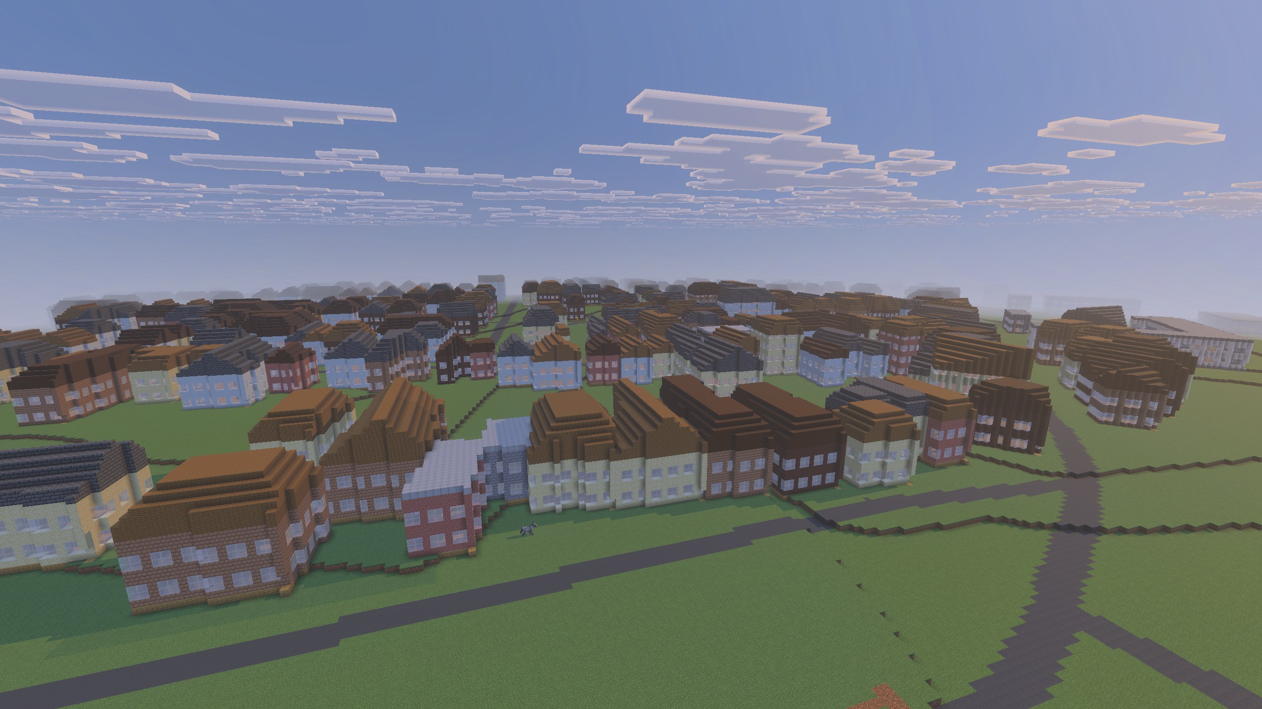 A wide Minecraft view of generated buildings and roads created from map data.