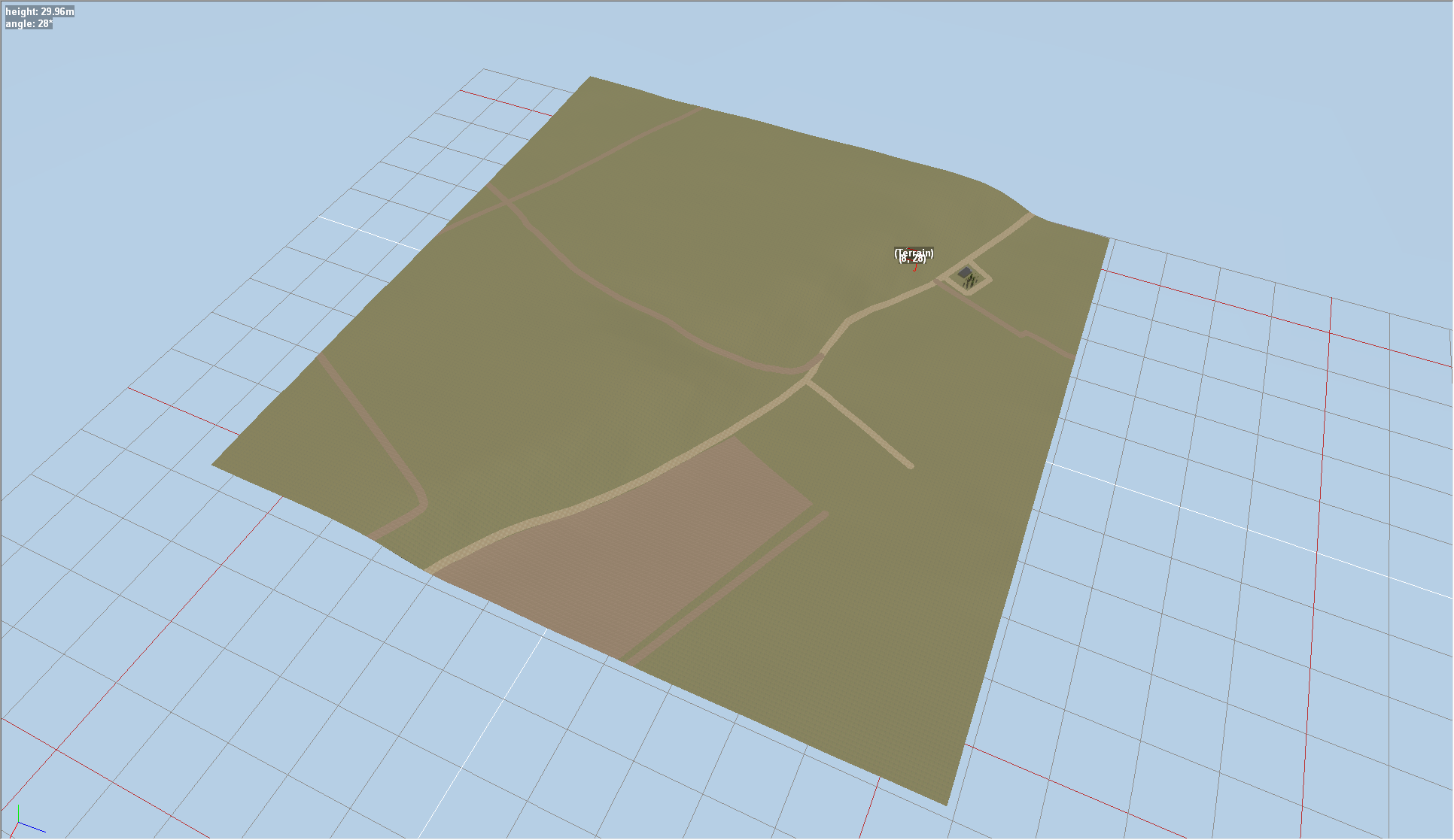 A wide overview in the SnowRunner Editor showing generated terrain, roads, ground textures, and a building area.